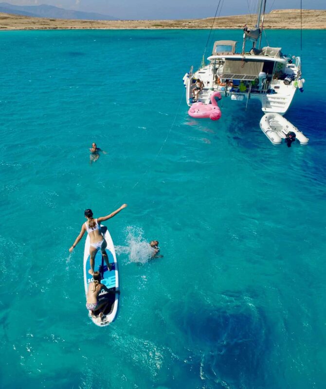 sup-kids-playing-catamaran